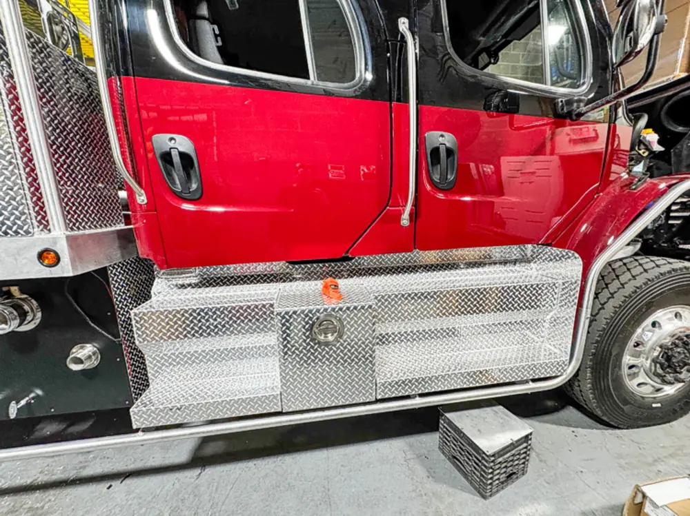 Apparatus in production bay with hood open, photo 71 of 303.